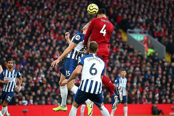 Virgil van Dijk scoring the opening goal for Liverpool