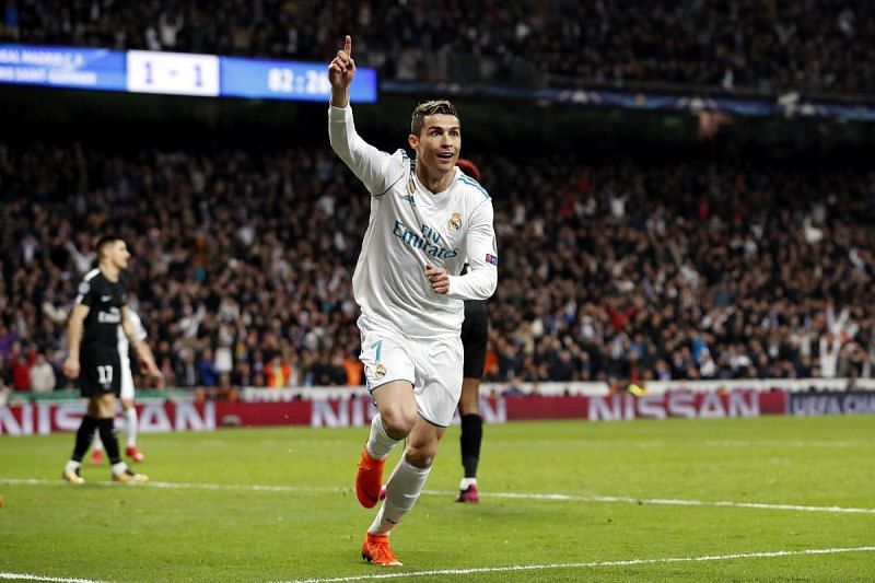 Cristiano Ronaldo reacts after scoring one of his goals against PSG