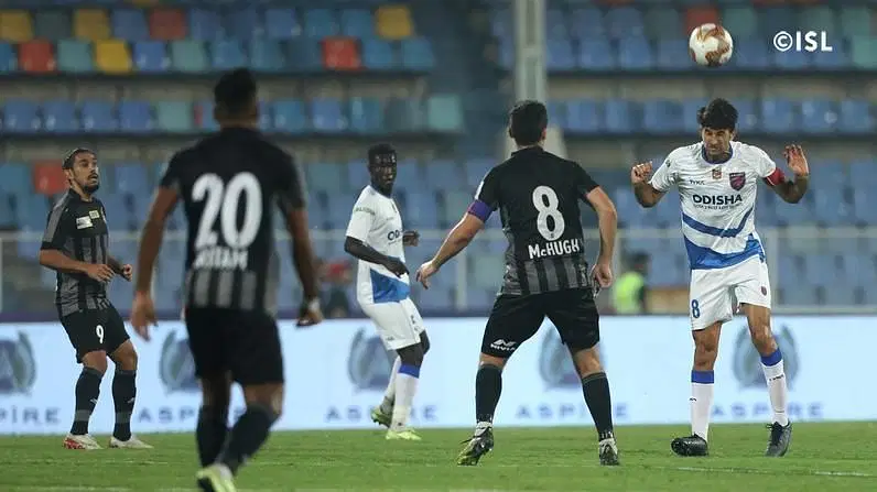 Marcos Tebar (extreme right) in action against ATK.