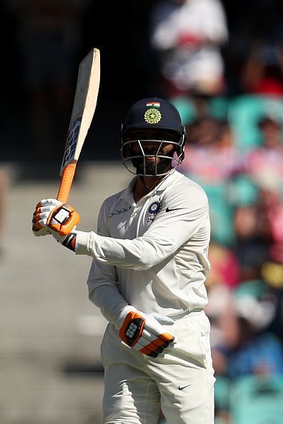 Jadeja with his trademark Swordfight celebration after reaching fifty