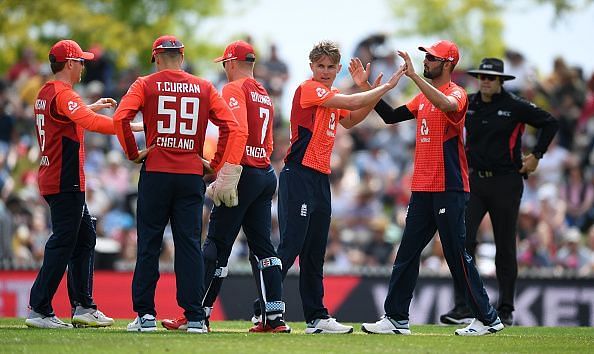 England celebrate the fall of a wicket