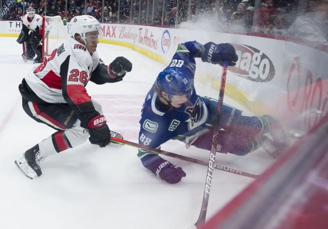 Roussel scores in return, Canucks beat Senators 5-2