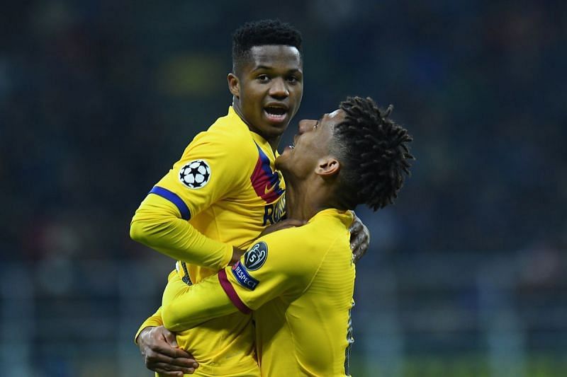 Ansu Fati (left) rejoices after scoring against Inter Milan