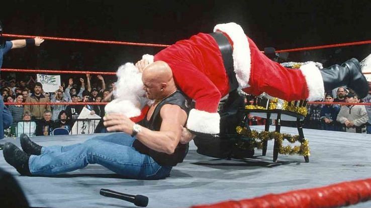 Stone Cold gives a Stunner to Santa Claus to the wild cheers of the audience.