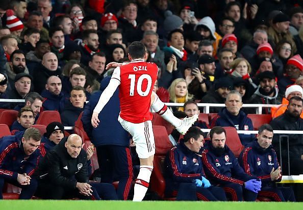 Mesut Ozil cut a frustrated figure after being subbed off against Manchester City