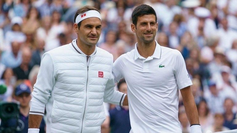 Roger Federer (left) and Novak Djokovic pose before their historic 2019 Wimbledon final