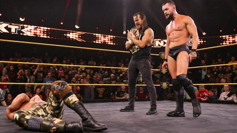 Finn Balor defeated Tommaso Ciampa with the help of Adam Cole