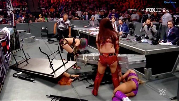 Becky Lynch kept checking up on the injured Kairi Sane throughout the match