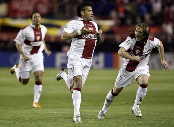 Dani Alves (c) playing for Sevilla