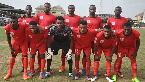 Abia Warriors players line up before a match