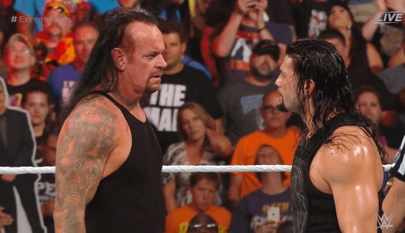 Taker and Reigns following their victory at Extreme Rules