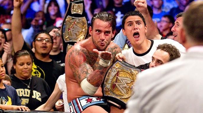 CM Punk after winning the WWE Championship at Money In The Bank 2011