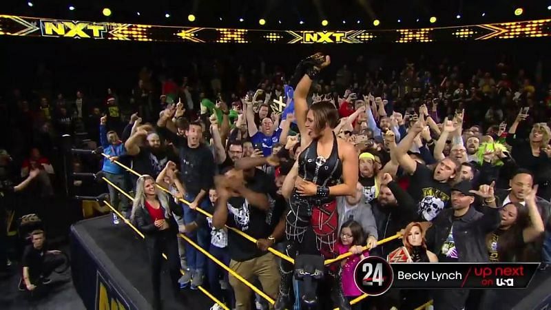 Rhea Ripley celebrates with the NXT Universe