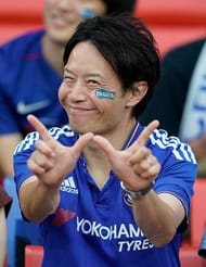 Does the acquisition of Minamino enhance Liverpool's chances of attracting Yokohama Tyres as their sponsor?