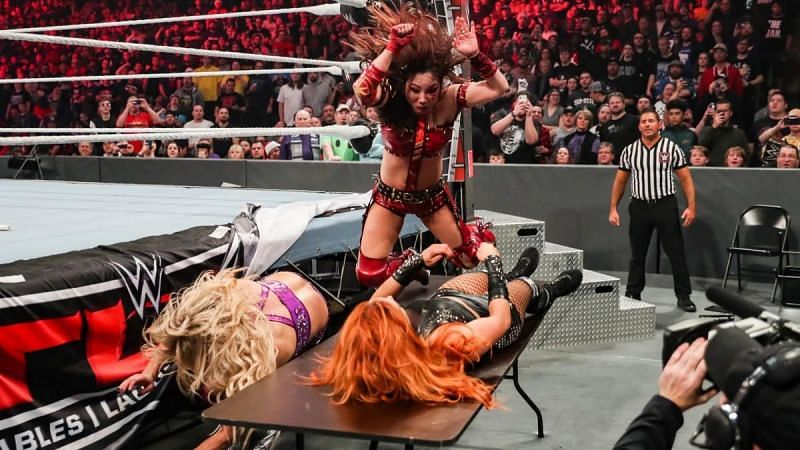 Lynch and Charlotte did everything they could to protect an injured Kairi Sane