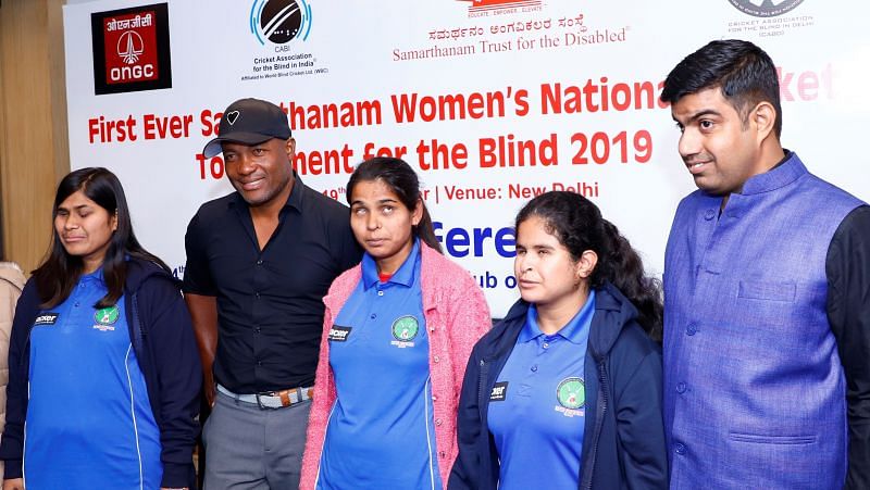 Delhi Blind Women&#039;s team captain Ankitha (L) is pictured alongside Brian Lara