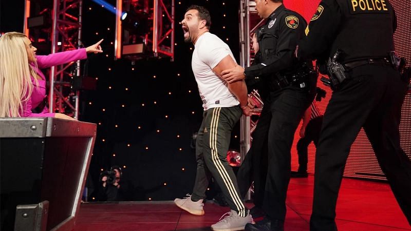 Rusev getting escorted away