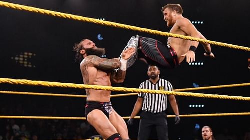 Travis Banks hitting Jaxson Ryker with a dropkick