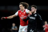 Arsenal's Luiz in an aerial tussle against Brighton & Hove Albion