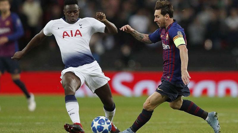 Victor Wanyama vies for the ball against Barcelona Talisman Lionel Messi in a UCL fixture
