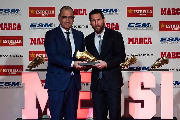 Lionel Messi receiving the Golden Shoe award