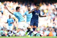 Manchester City's Laporte launches into a tackle