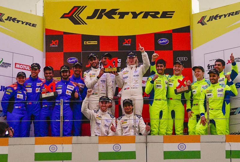 Winners pose on the podium of the&Acirc;&nbsp;inaugural leg of the X1 Racing League.