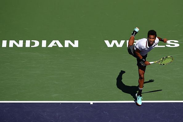 Felix Auger Aliassime serving at Indian Wells Masters, California