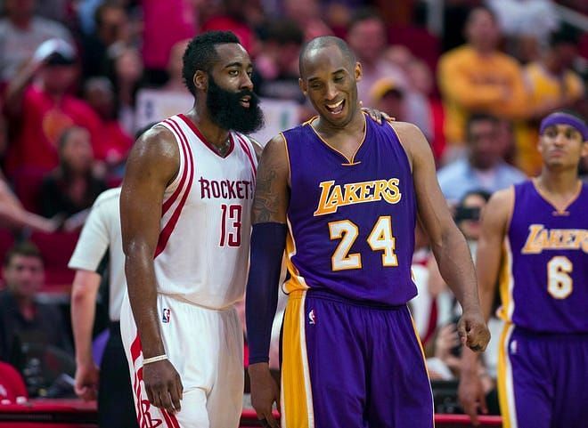 Kobe Bryant and James Harden share a moment during a game.
