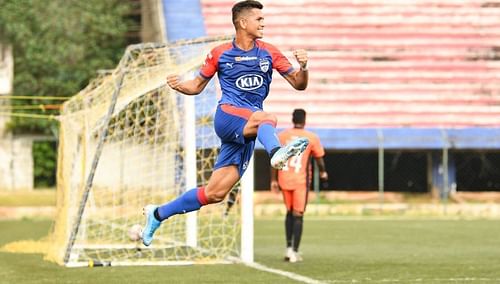 Bengaluru FC midfielder Ajay Chhetri celebrates scoring a goal against South United FC in the BDFA Super Division League, at the Bengaluru Football Stadium, on Monday.