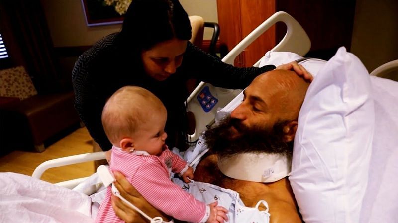 Tommaso Ciampa visited by his wife and child after neck surgery