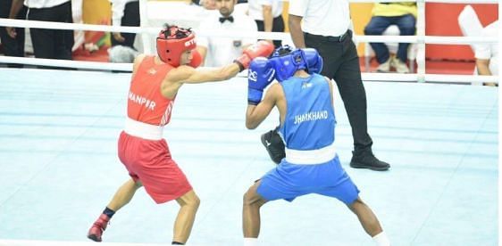 Barun Singh (left) in action during his final bout at KIYG 2020