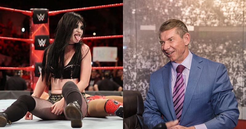 Paige and Vince McMahon.