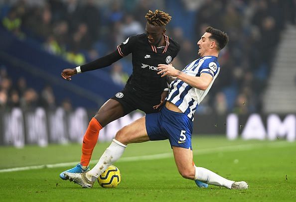 Brighton &amp; Hove Albion&#039;s Dunk in action against his apparent suitors