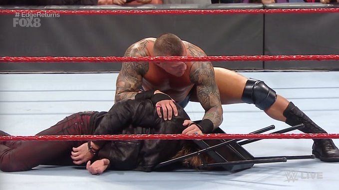 Orton brutalizing Edge