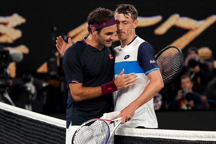 Roger Federer(L) and John Millman(R) after their third-round match at the Australian Open 2020