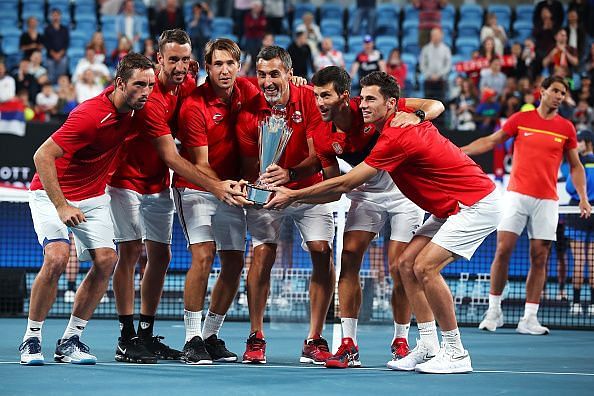 Novak Djokovic with the victorious Serbian team at the end of the ATP Cup