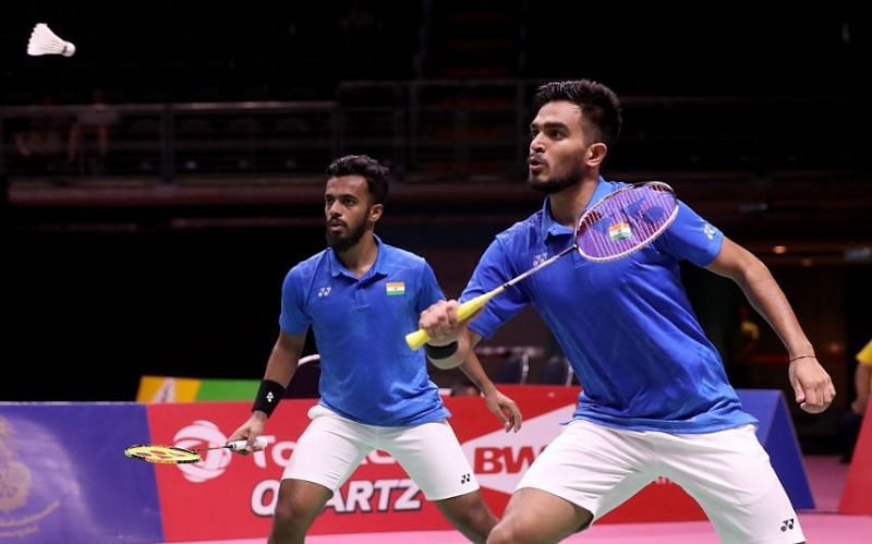 Arun George looks on as his partner Sanyam plays a shot (Image credits - BWF)