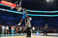 Hamidou Diallo dunks over Shaquille O'Neal during the 2019 Slam Dunk Contest