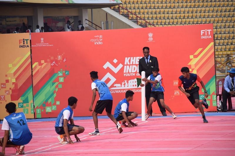 Gujarat chaser in action against Maharashtra defender during the finals