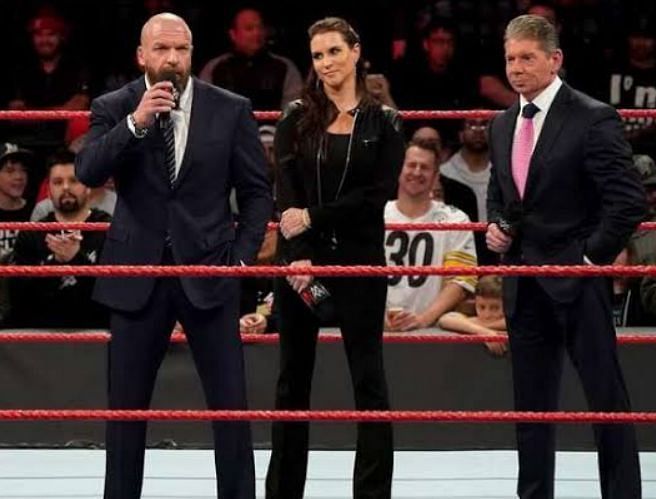 Triple H, Stephanie McMahon, and Vince McMahon