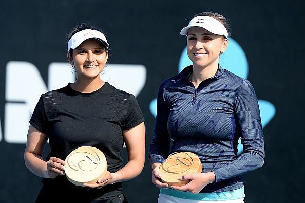Sania Mirza poses with the trophy along with Nadiia
