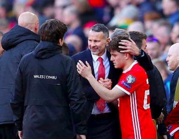 Wales manager Ryan Giggs congratulates James on his winning goal against Slovakia after the final whistle