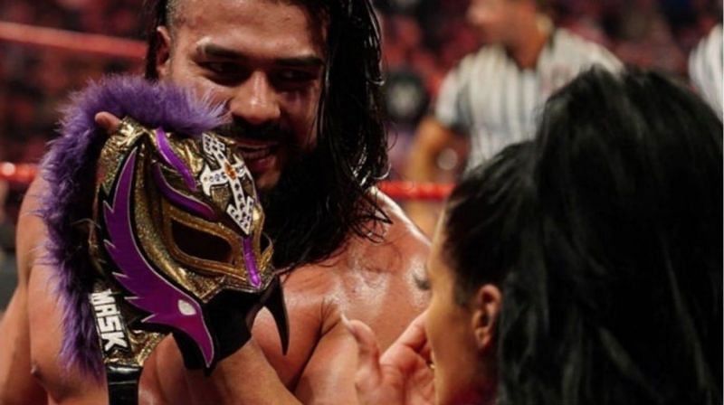 Andrade left the Arena with Mysterio&#039;s mask