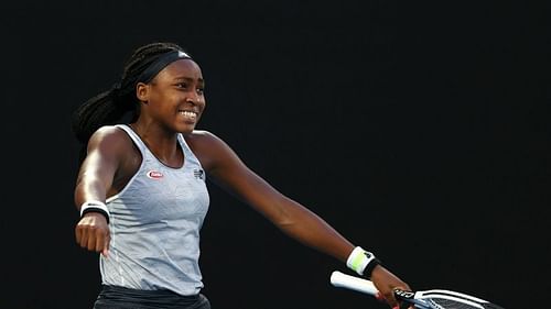 Coco Gauff celebrates victory over Naomi Osaka