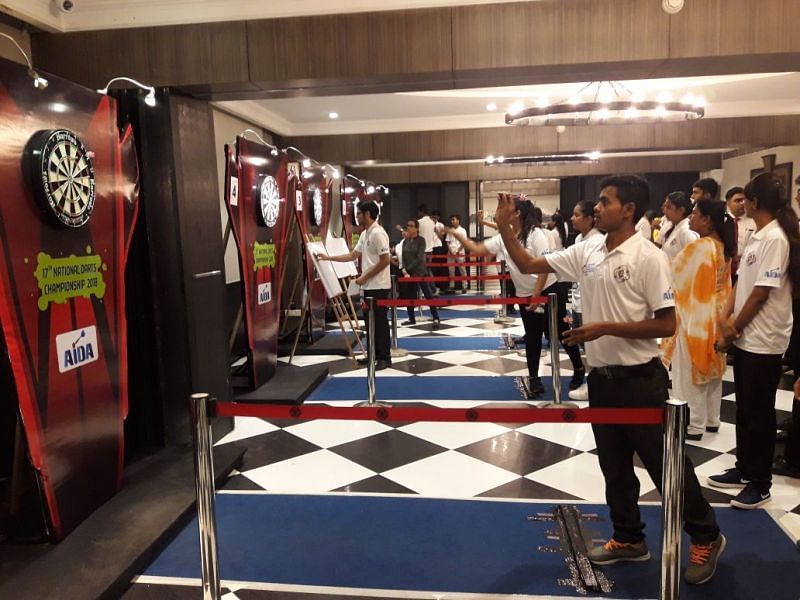 Indian darts players compete at the 2018 WDF National Darts Championship.