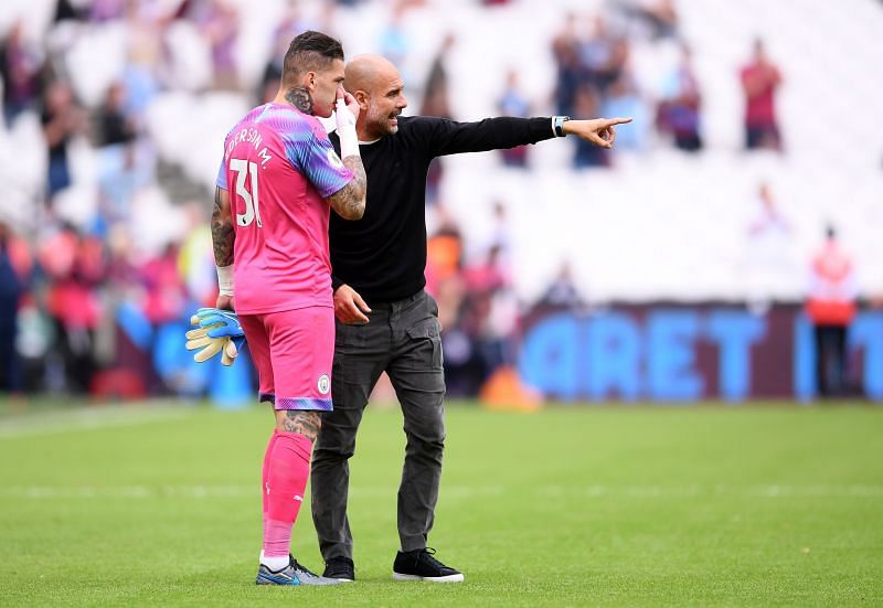 Pep Guardiola and Manchester City keeper Ederson