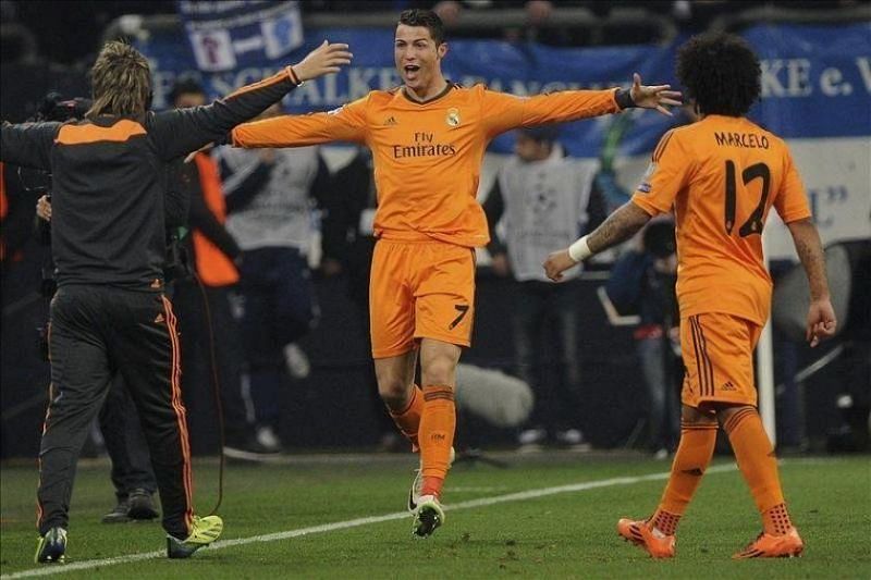 Ronaldo exults after scoring against Schalke in the 2013-14 UCL Round of 16 first leg