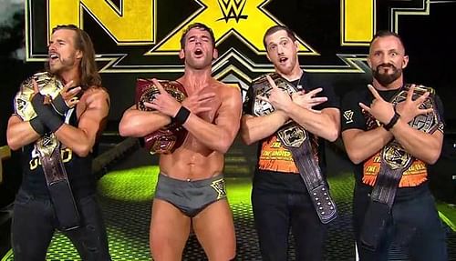 The Undisputed Era with all the gold