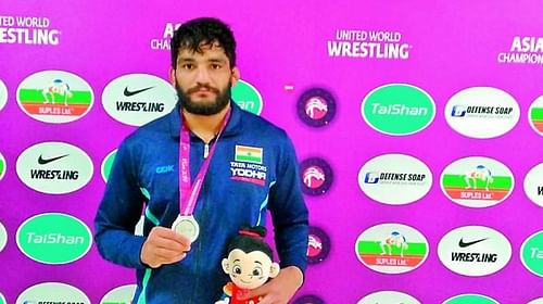 Sunil Kumar clinched gold for India in the Men's